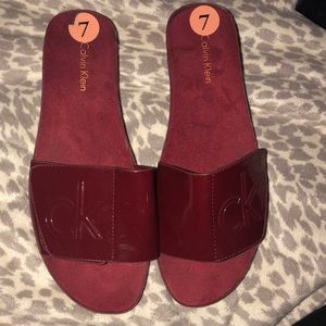 Calvin Klein Reddish maroon slip on shoes